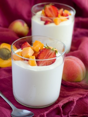 Cups of yogurt with fresh fruit